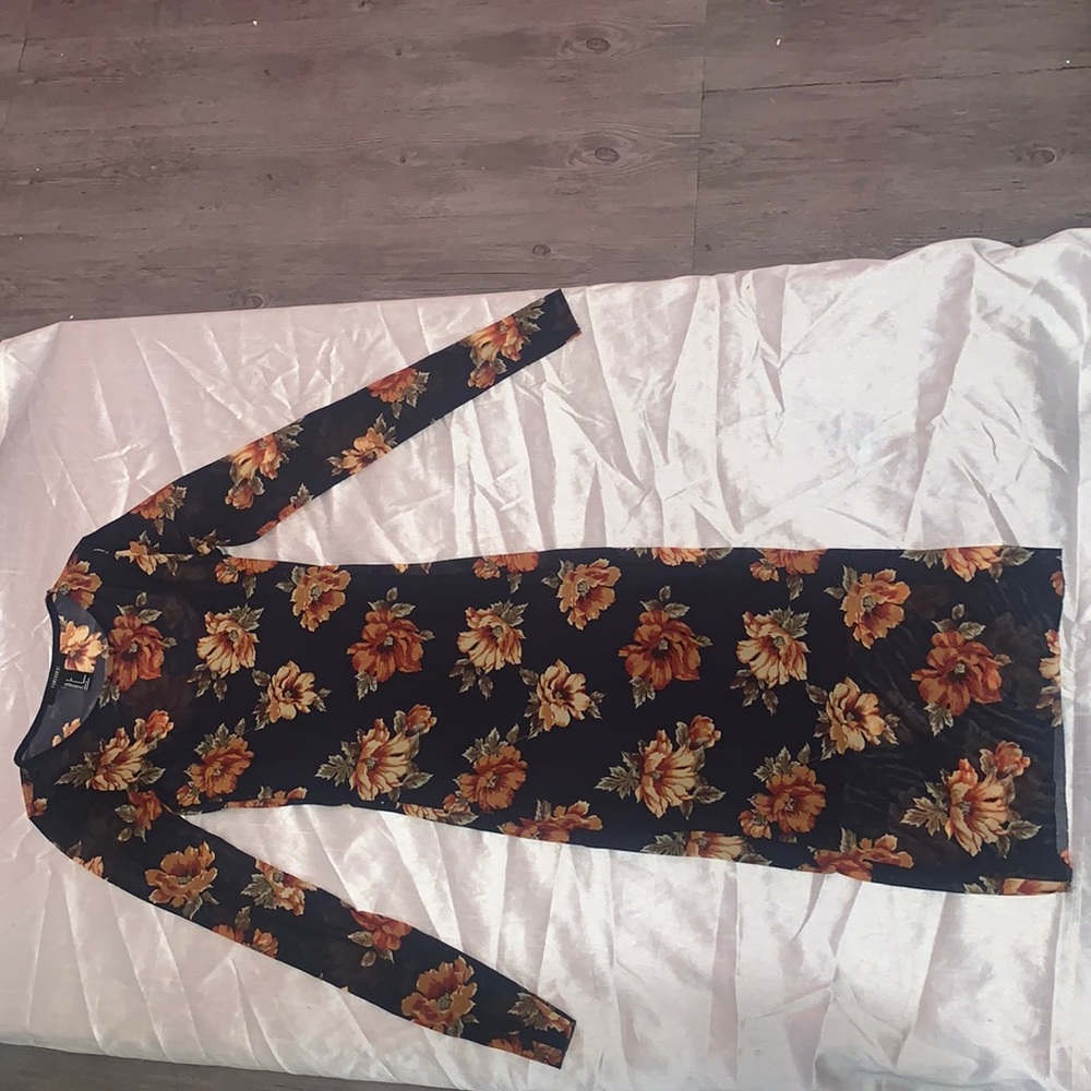 Mesh long sleeve navy blue floral print dress. Midi length.